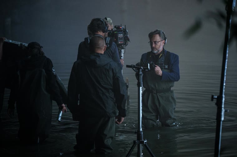 Waist-deep at night, the camera in the lake with the scene — Episode 1.