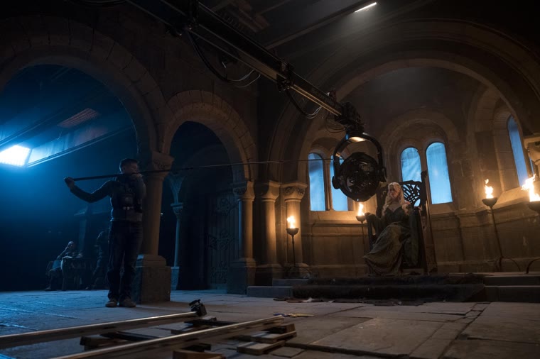 Morgian on the throne in the Great Hall of Caer Loth — Episode 4.