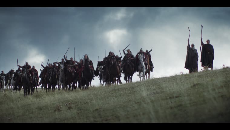 A Cymry war band and a Roman Ala crest the hill before battle.