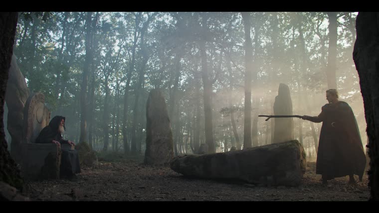 Taliesin (James Arden) finds a stranger in the Chief Druid’s seat: “It is unwise to sneak up on a man while he prays.”