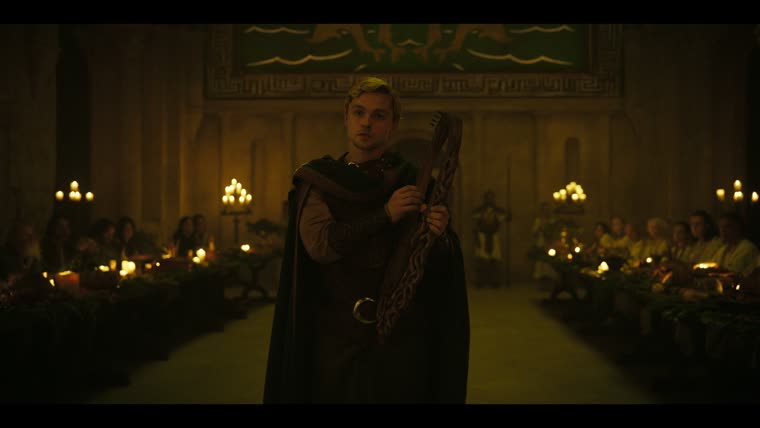 Taliesin (James Arden) sings the Lament of Pwyll before the court of Ynys Avallach.