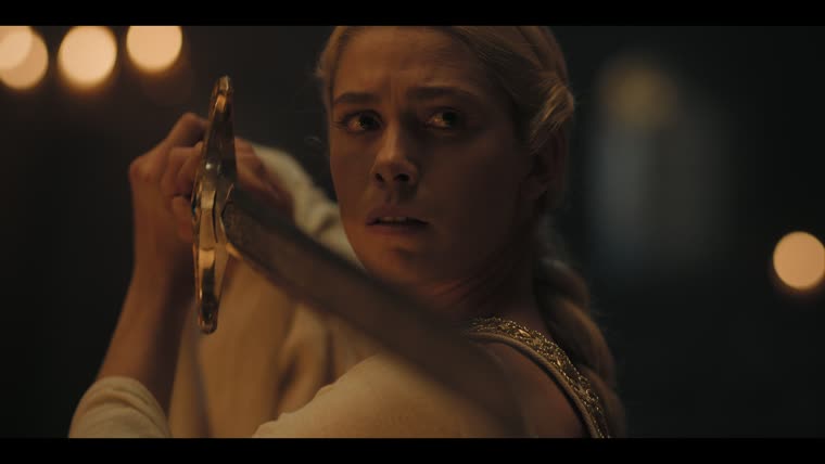 Charis (Rose Reid) with the Fisher King's Sword the night Taliesin climbs to her window.