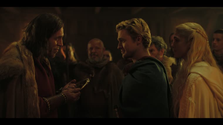 Pendaran (Christopher Sciueref) gives Taliesin (James Arden) the torc: “Taliesin shall reside here as bard to me.”