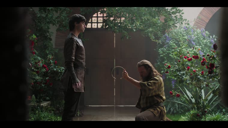 "If I am a king, I'm not a very good one." Tewdrig (David Brooks) offers the torc to Merlin (Tom Sharp).
