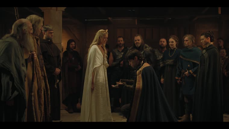 Charis (Rose Reid) bestows the Fisher King's Sword. “Take me up.”