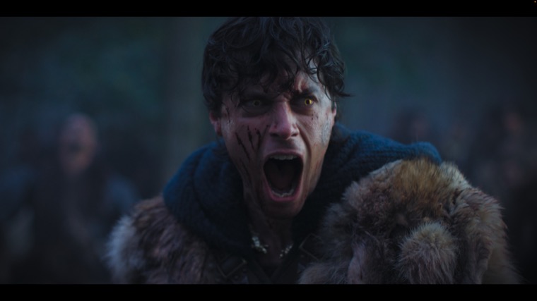 Merlin (Tom Sharp) in pain and rage.